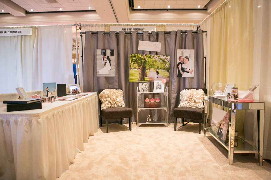 Inspiration for a photographer bridal show booth idea