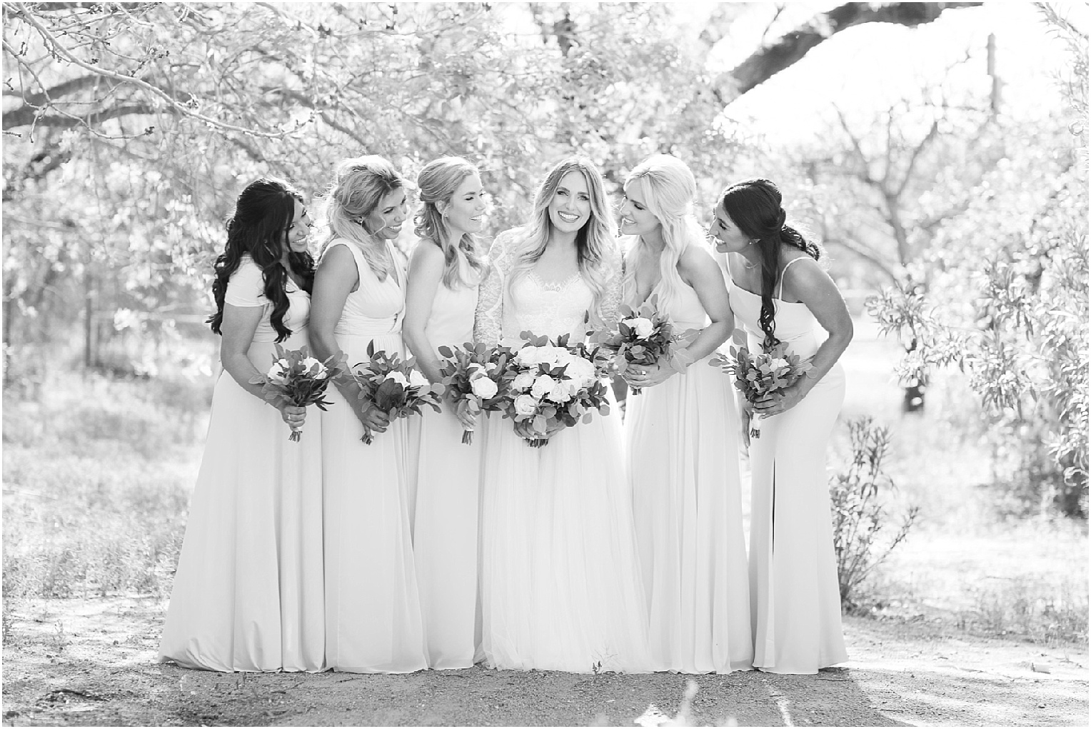 Intimate Backyard Wedding Tucson, AZ Chanel + Eddie blush bridesmaids dresses and greenery bouquets