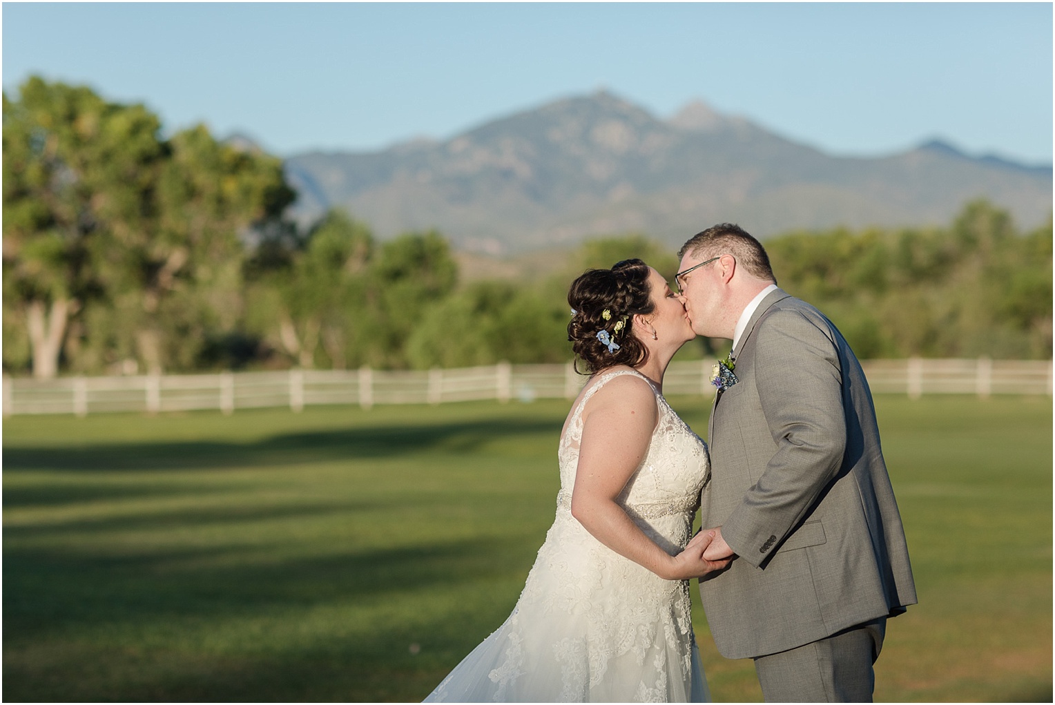 Tubac Golf Resort Wedding Tucson AZ Ashley and Paul rustic vintage shades of blue wedding mountain range bride and groom portraits