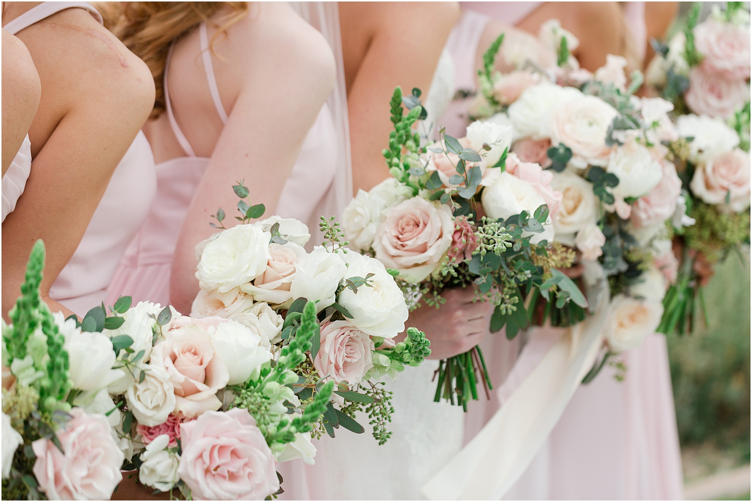 Highlands at Dove Mountain Wedding Grace + Danny bridesmaids with romantic blush and ivory bouquets and floor length blush dresses