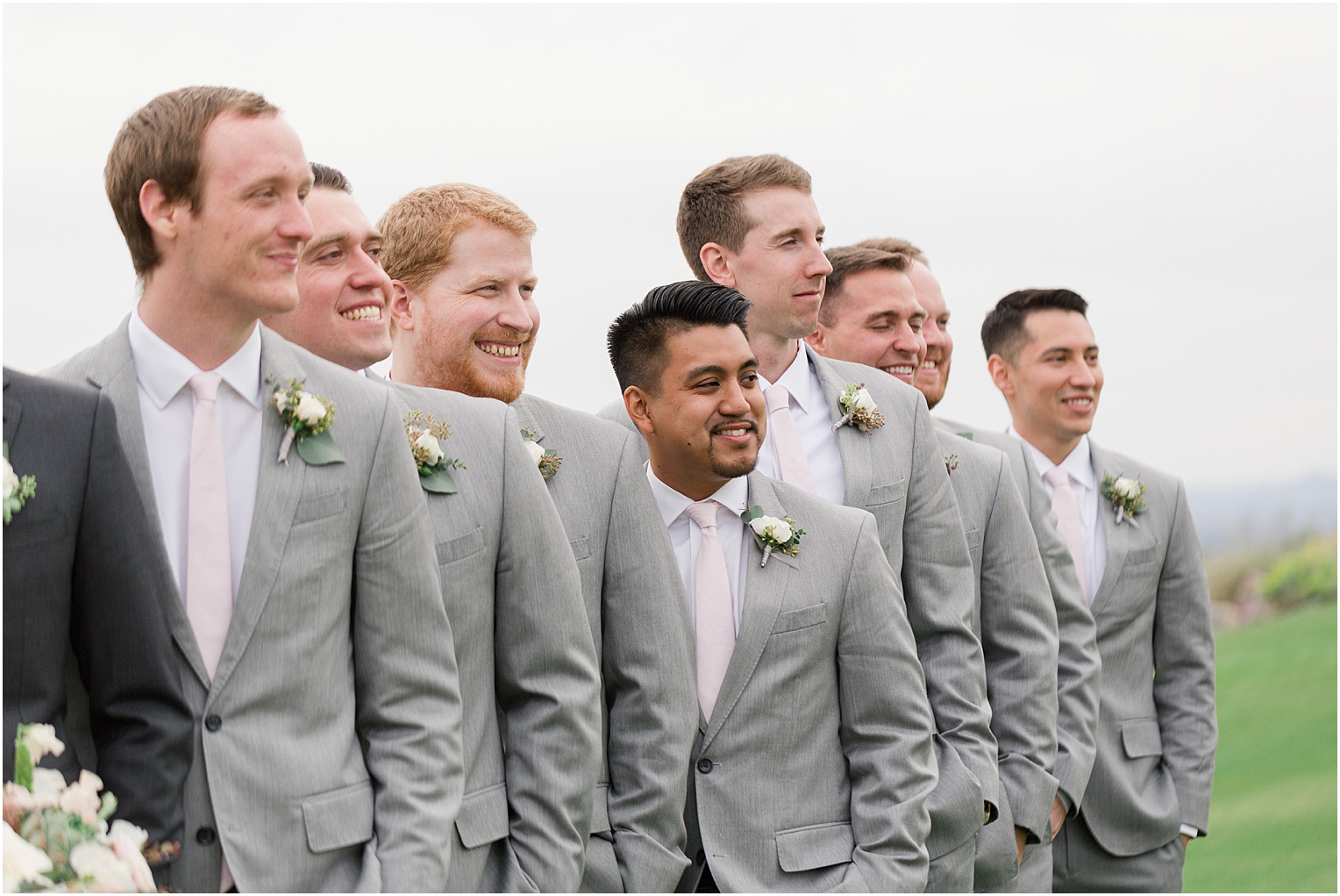 Highlands at Dove Mountain Wedding Grace + Danny groomsmen in grey and charcoal tuxes