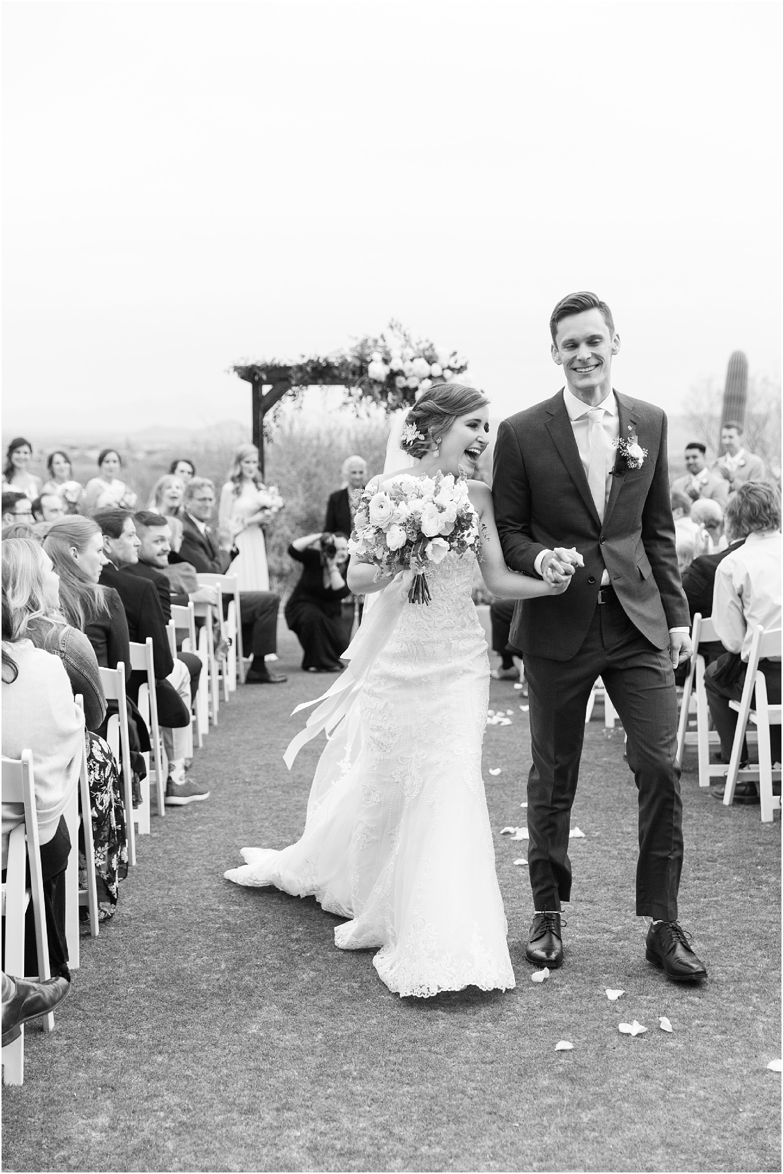 Highlands at Dove Mountain Wedding Grace + Danny black and white romantic bride and groom photos of the wedding ceremony recessional