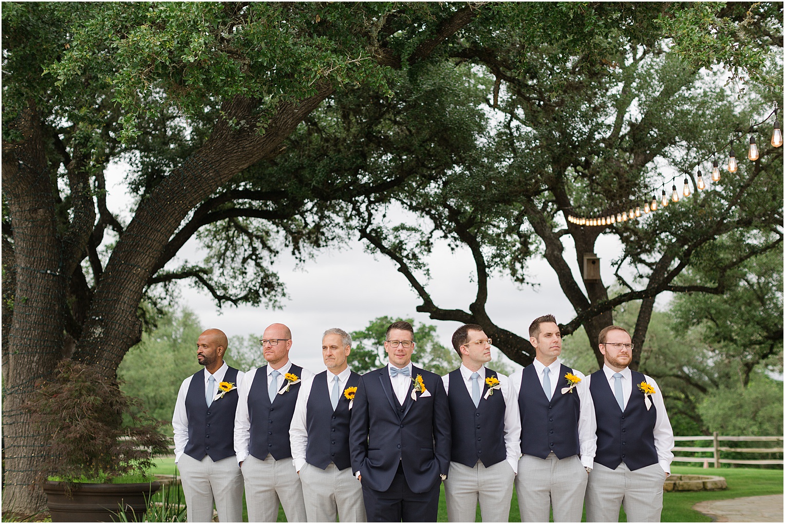 Garden Grove Wedding Venue in Austin, Texas Sarah & Viktor light blue and sunflower wedding groomsmen photos