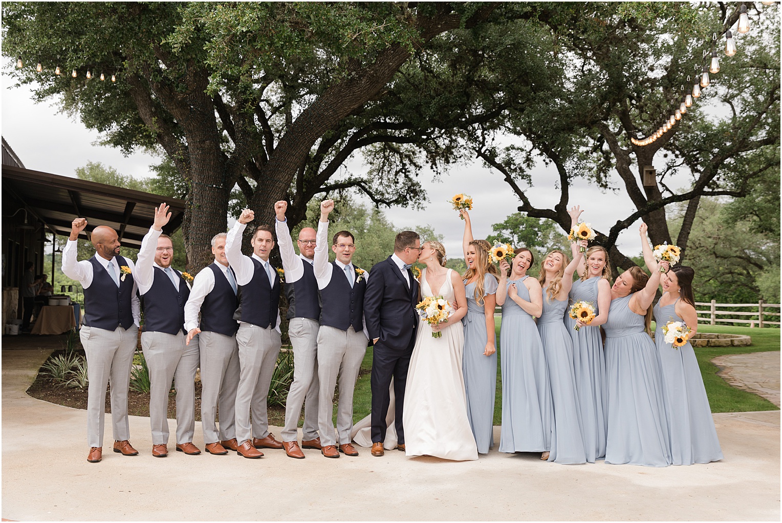 Garden Grove Wedding Venue in Austin, Texas Sarah & Viktor light blue and sunflower wedding bridal party photos