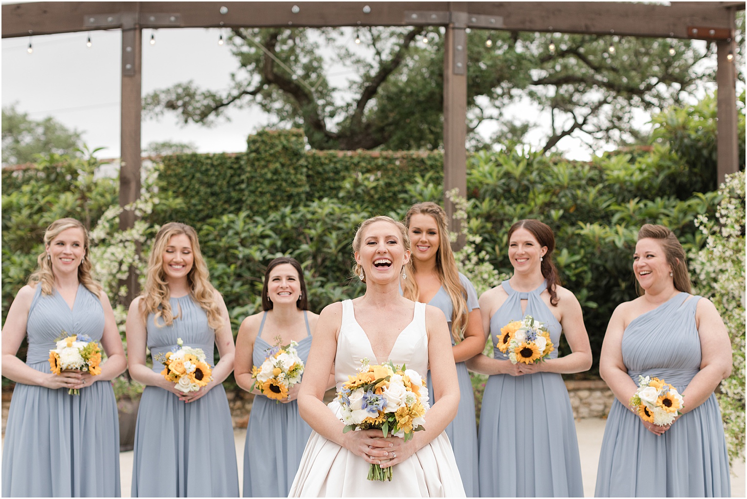 Garden Grove Wedding Venue in Austin, Texas Sarah & Viktor light blue and sunflower wedding bridesmaid photos