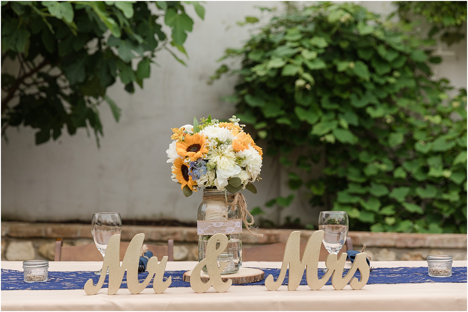 Garden Grove Wedding Venue in Austin, Texas Sarah & Viktor light blue and sunflower wedding outdoor reception details