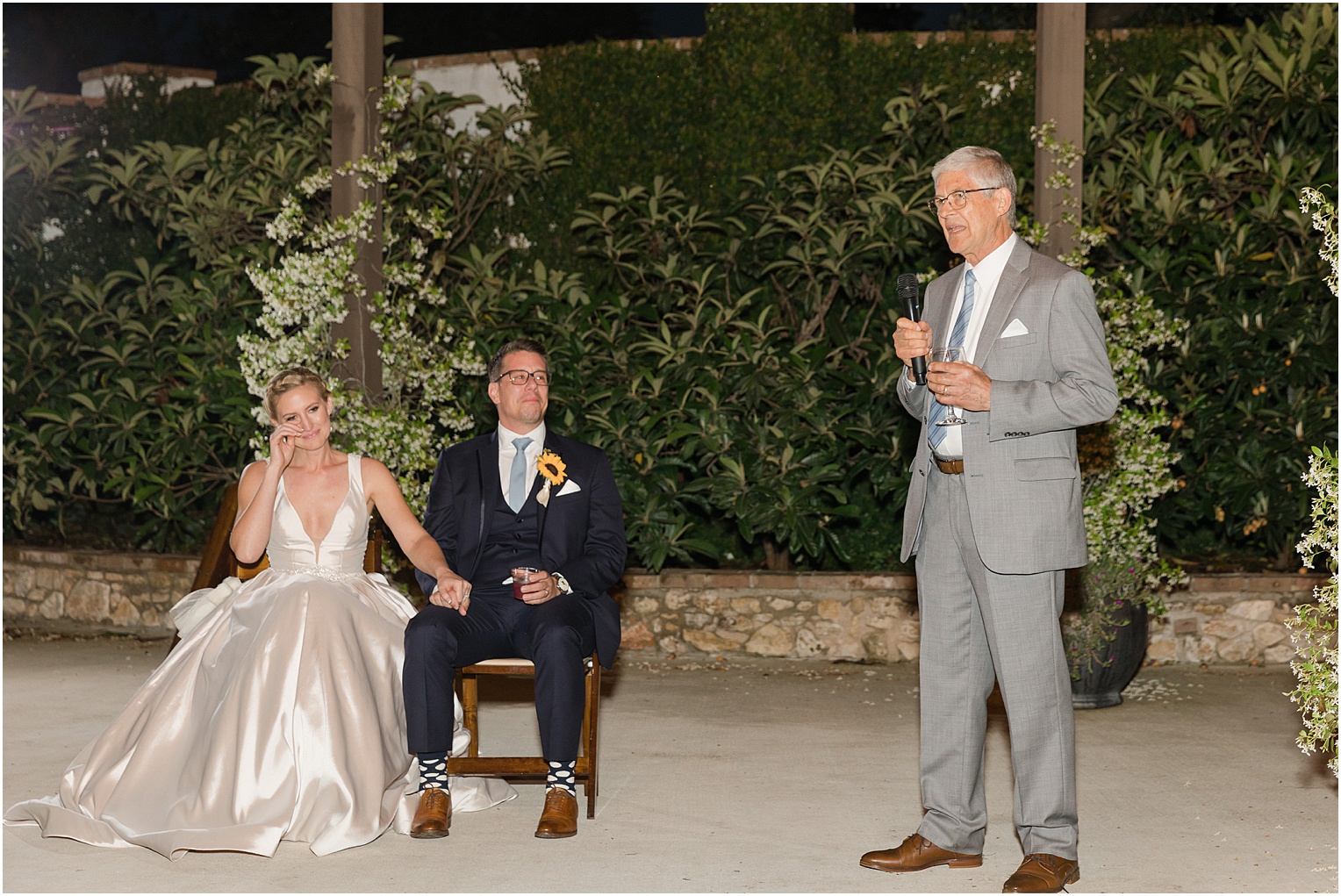 Garden Grove Wedding Venue in Austin, Texas Sarah & Viktor light blue and sunflower wedding outdoor reception toasts