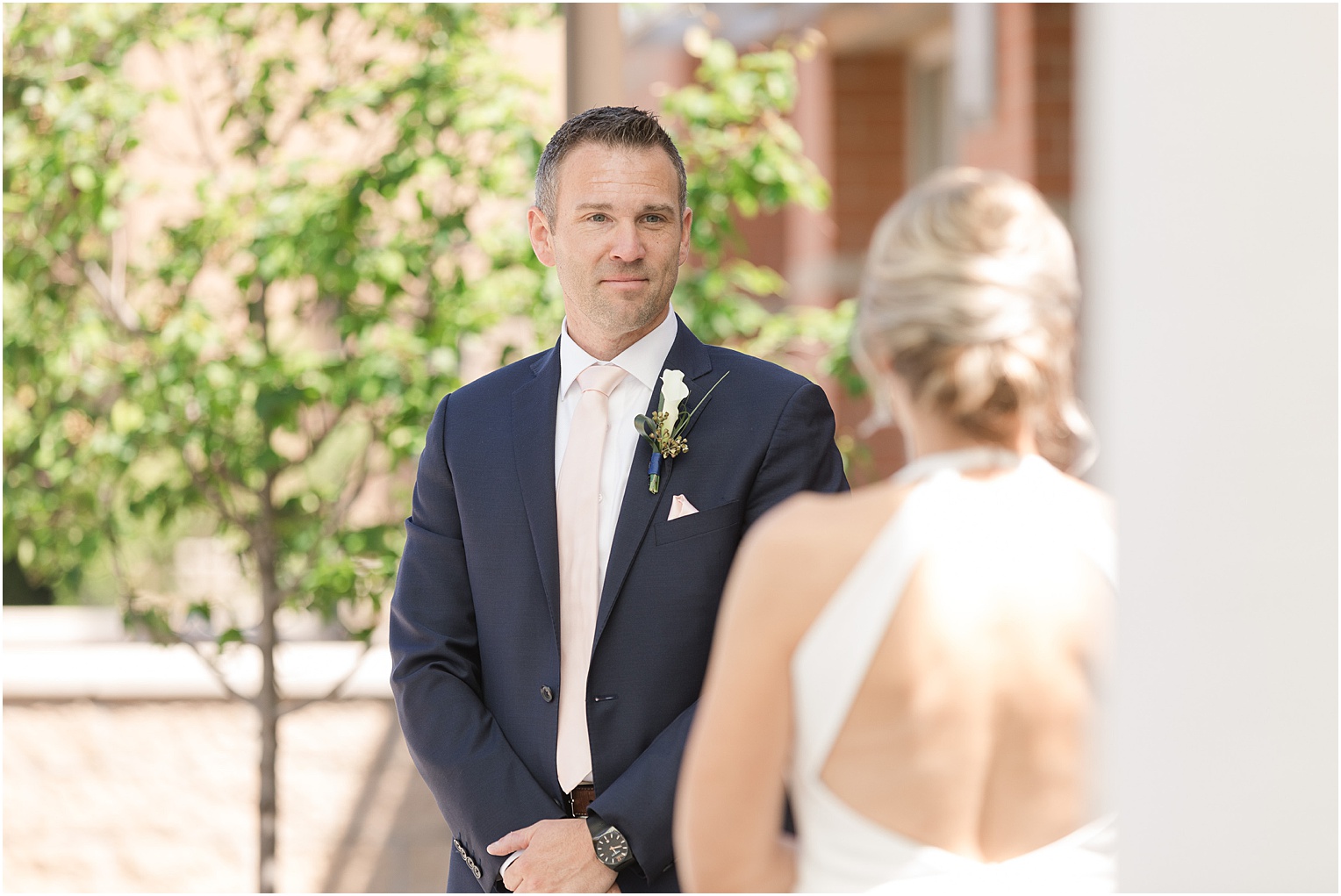 Kansas City Wedding at Union Horse Distilling Co. Danielle + Brandon Neutral White and Navy Spring wedding bride and groom first look