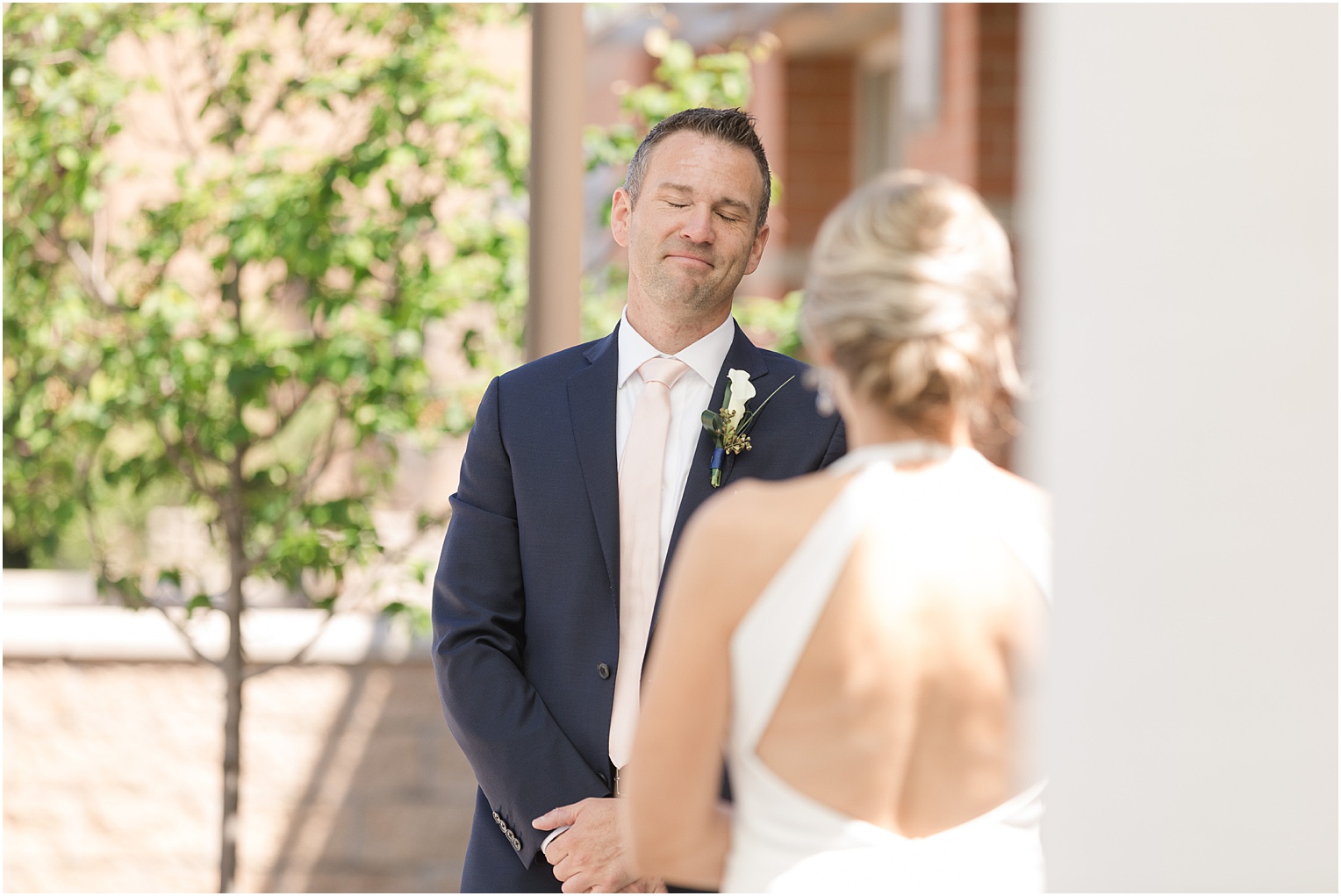 Kansas City Wedding at Union Horse Distilling Co. Danielle + Brandon Neutral White and Navy Spring wedding bride and groom first look