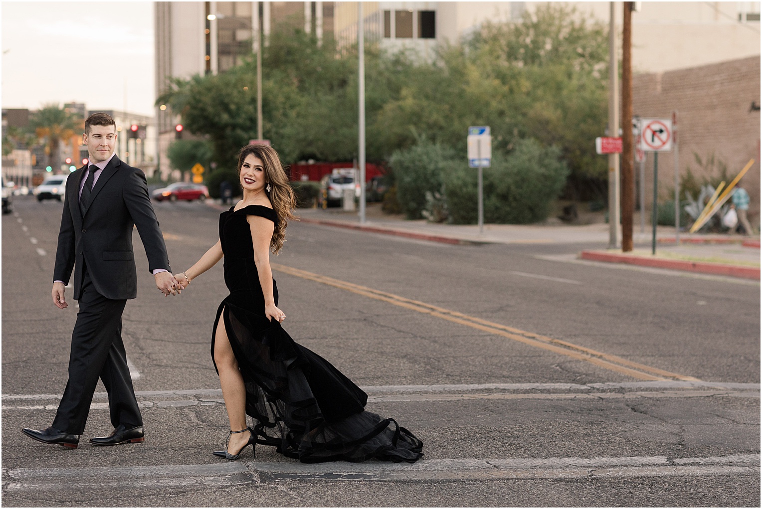Elegant Downtown Tucson engagement pictures Tucson AZ Farnaz + Brian floor length black evening dress
