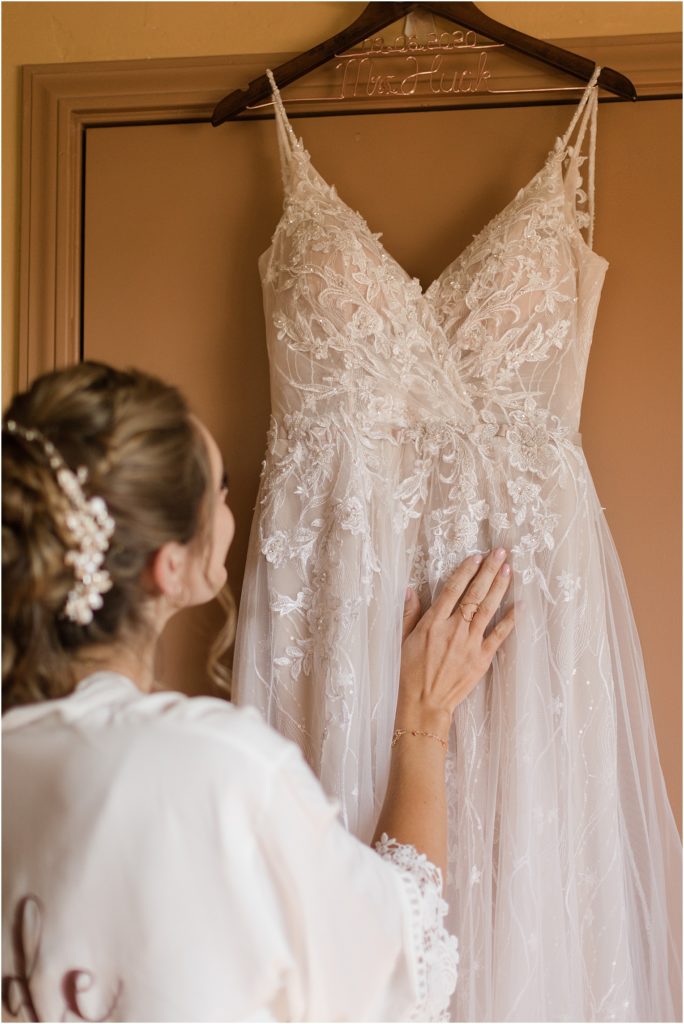 Hacienda Del Sol Wedding Tucson, Arizona bride getting ready with neutral details and matching bridesmaid robes