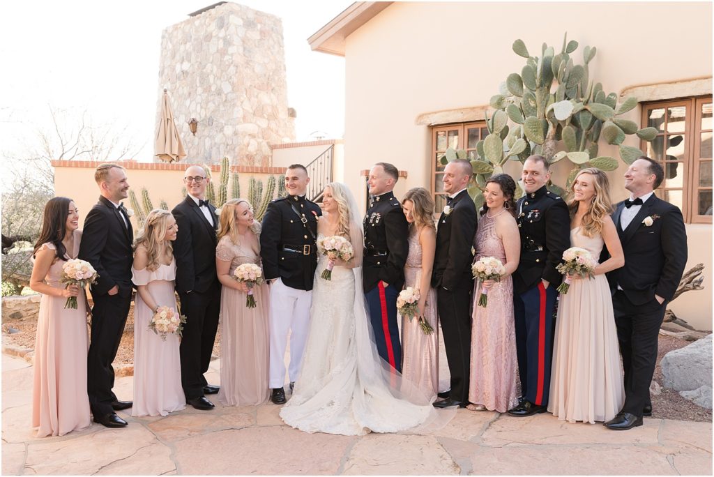Tanque Verde Ranch Wedding Tucson, AZ Sloan + Garrett bridal party photos with bridesmaids in shades of blush dresses and blush bouquets and groomsmen in military uniforms