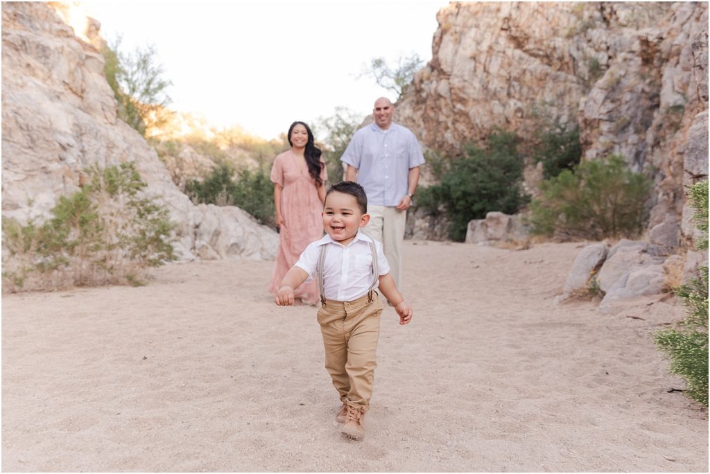 Family Photos at Honeybee Canyon Tucson, AZ Melissa + Matt little boy running at desert photo shoot in Oro Valley
