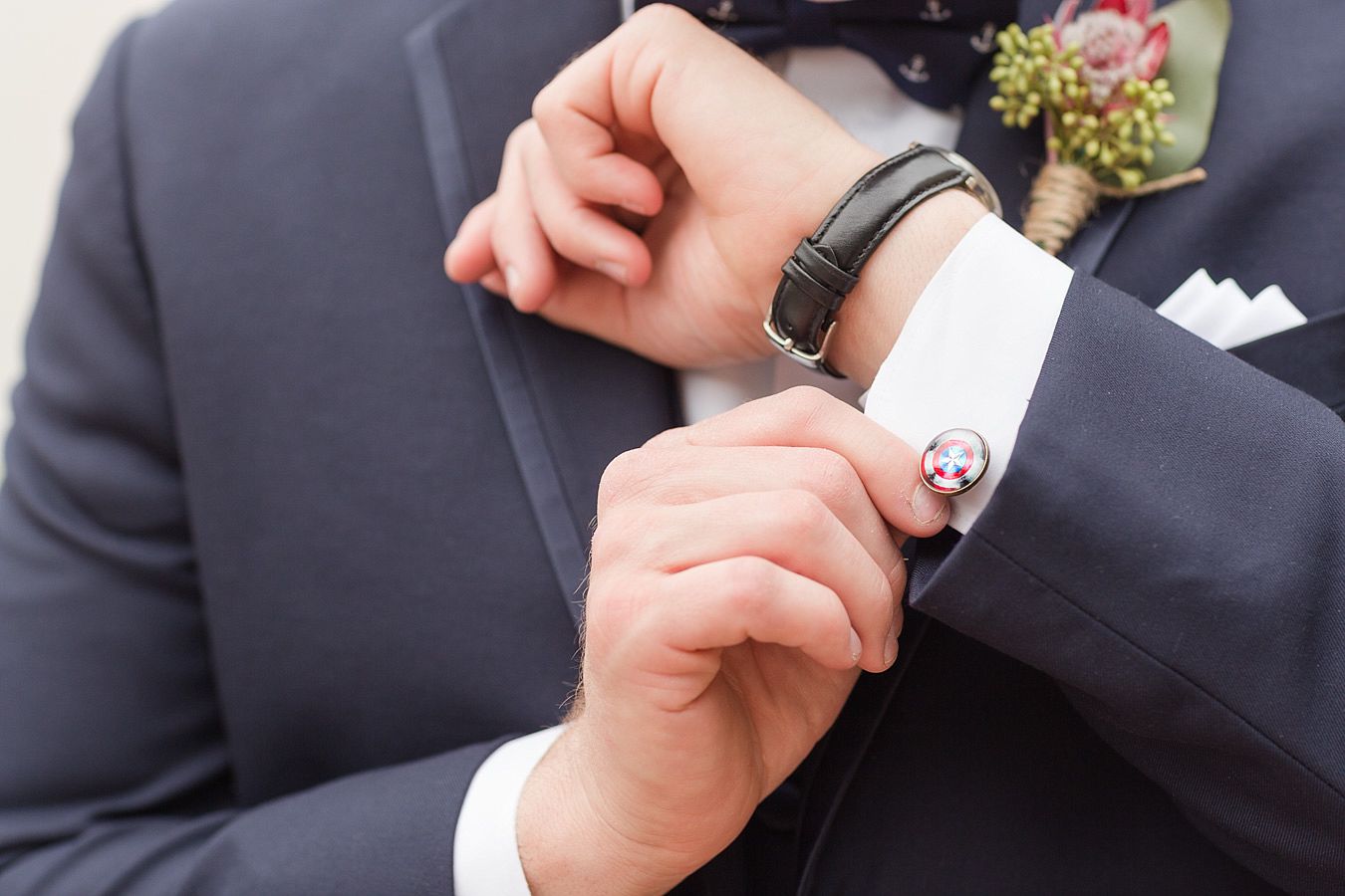 groom, boutineer, navy suit